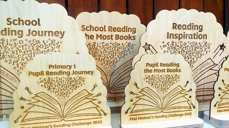 First Minister's Reading Challenge trophies of carved wood